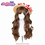 Caramel brown long wavy wig with airy bangs - front view; styling hat and clip not included